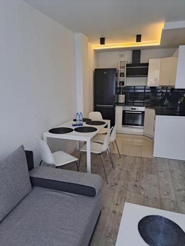 Kuchyň nebo kuchyňský kout v ubytování Apartament Miejski