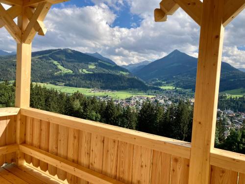 a view from the porch of a wooden gazebo at Heissgut in Altenmarkt im Pongau