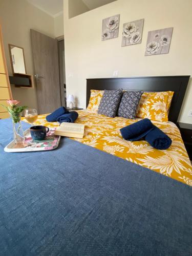 Postel nebo postele na pokoji v ubytování Kaldis Apartment