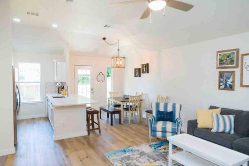 a living room with a couch and a table at Gruene Getaway in New Braunfels