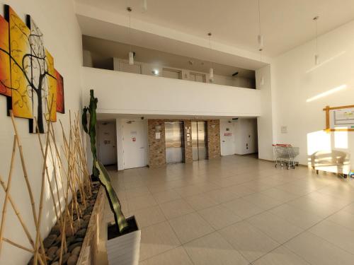 a large room with a large tile floor and ceilings at Atacama Valley 3 in Copiapó