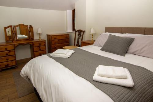 Postel nebo postele na pokoji v ubytování Parkfields Barns Self Catering Accommodation