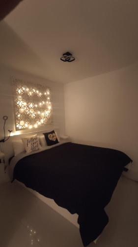 Cama o camas de una habitación en Winnie's Homestay