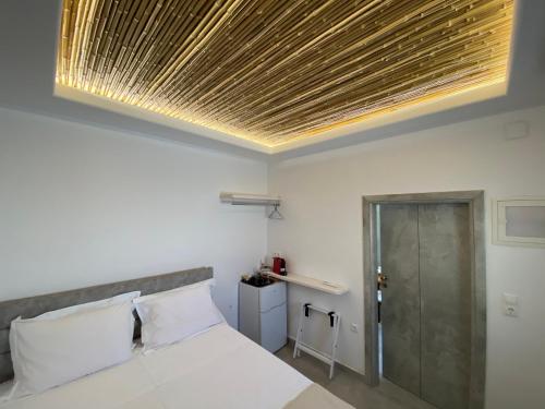 AVALON Luxury Suitesにあるベッド