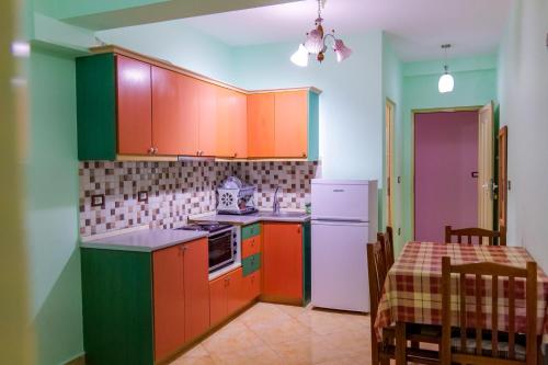 Kuchyň nebo kuchyňský kout v ubytování Rei Apartments
