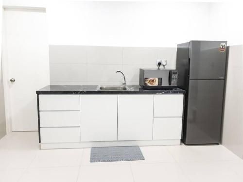 Dapur atau dapur kecil di The Loft Imago, Block D - BeOurGuest-