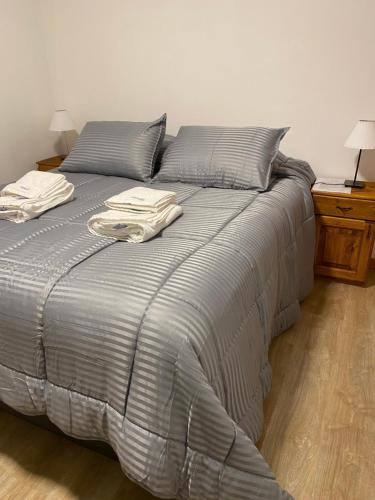 Llit o llits en una habitació de Departamento Andes Drury - Deptosxlosandes