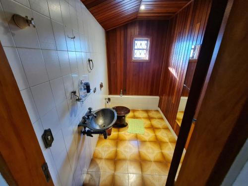 Ванная комната в Casa Vila Telma