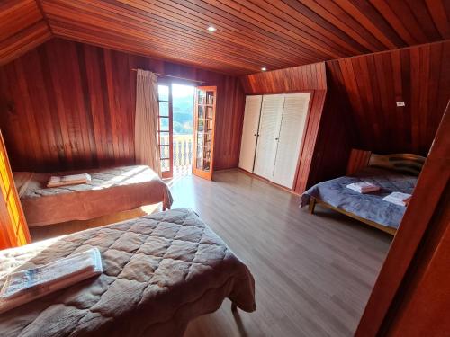 Кровать или кровати в номере Casa Vila Telma