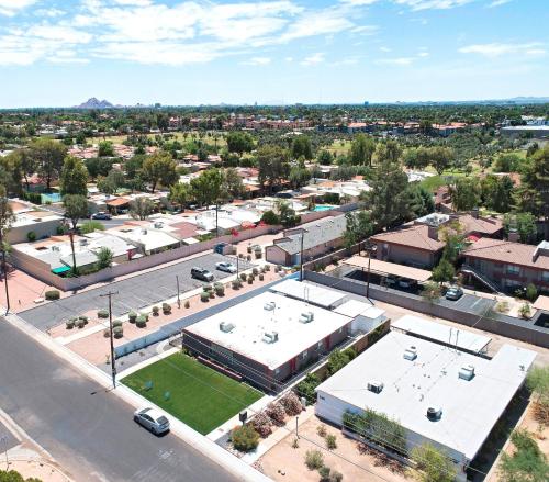 an aerial view of a city with buildings and a street at LaRocco On Turney Biltmore in Phoenix