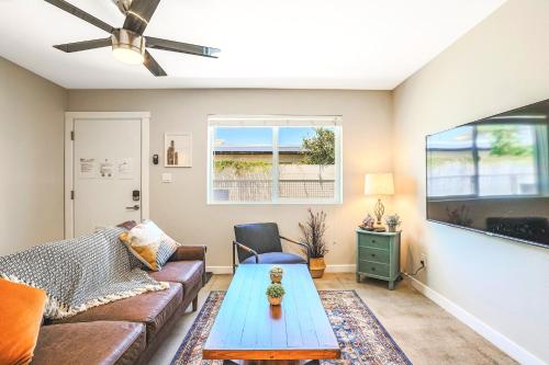 a living room with a couch and a table at LaRocco On Turney Biltmore in Phoenix