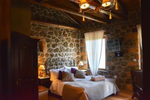 Postel nebo postele na pokoji v ubytování Nymfes Guesthouse