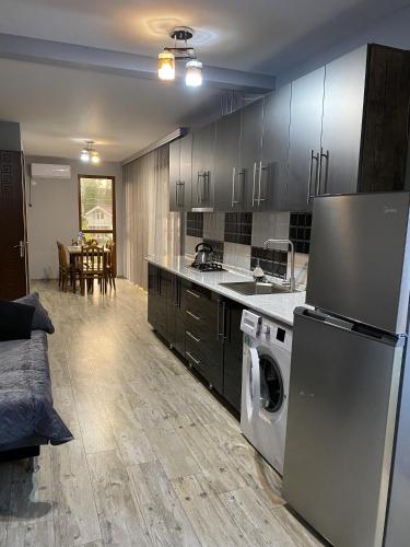 Dapur atau dapur kecil di Cottages Ureki