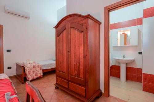 Postel nebo postele na pokoji v ubytování Antico Frantoio Cairoli B&B Exclusive Room
