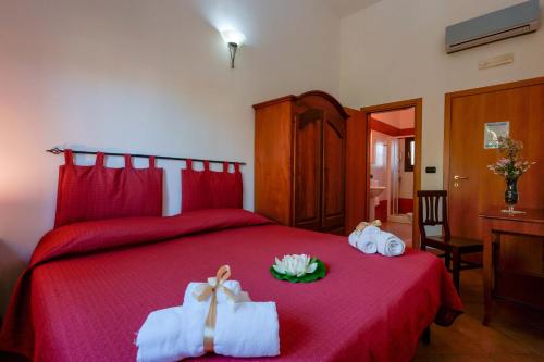 Postel nebo postele na pokoji v ubytování Antico Frantoio Cairoli B&B Exclusive Room