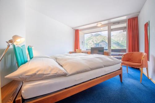 Postel nebo postele na pokoji v ubytování Hotel Gädi
