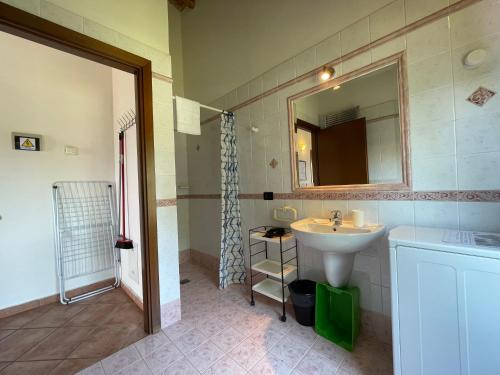 a bathroom with a sink and a mirror at Residence Bellavista in Manerba del Garda
