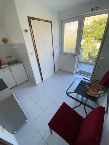 Kuchyň nebo kuchyňský kout v ubytování Apartment Marsela