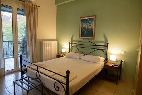 Cama o camas de una habitación en Tsertos Apartments