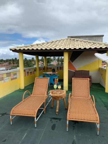 Ein Balkon oder eine Terrasse in der Unterkunft Pousada Triplex Pôr Do Sol