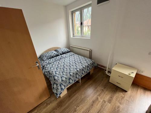 Postel nebo postele na pokoji v ubytování Apartmani Bogdana