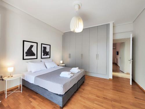 En eller flere senger på et rom på Etolou B5 - by Verde Apartments