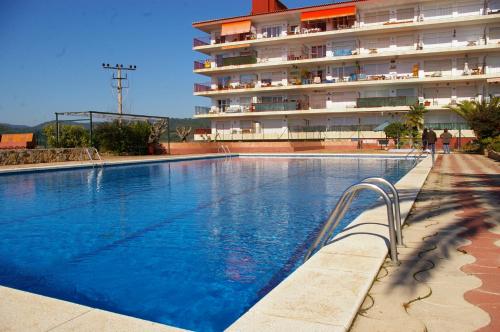 Studio de un solo ambiente con Terraza y piscina y 내부 또는 인근 수영장