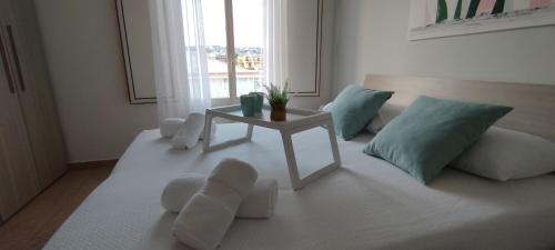 A bed or beds in a room at Stella Marina Holiday Home