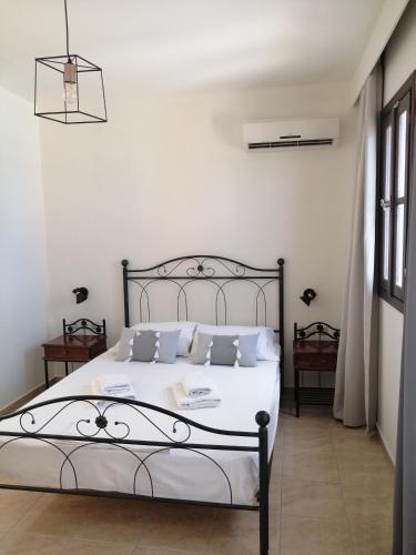 Letto o letti in una camera di OASIS APARTMENTS