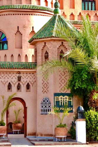 a building with a gazebo on the side of it at OZ Palace Ouarzazate & SPA in Ouarzazate