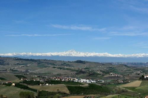 a view of a valley with a mountain in the background at Villa Bellavista Alba, B&B in Alba