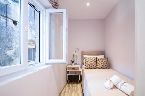 Posteľ alebo postele v izbe v ubytovaní Electra's house