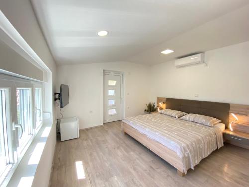 Lova arba lovos apgyvendinimo įstaigoje Guest Accommodation Grozdanić