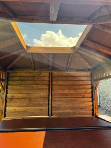 a view from the inside of a room with a window at Cwmgwn Farm in Llandovery