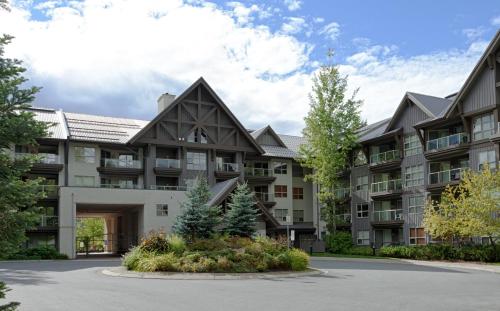 an exterior view of an apartment building at The Aspens by Whistler Premier in Whistler