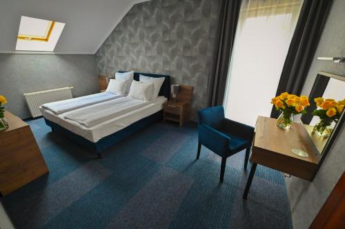Posteľ alebo postele v izbe v ubytovaní Hotel Rad