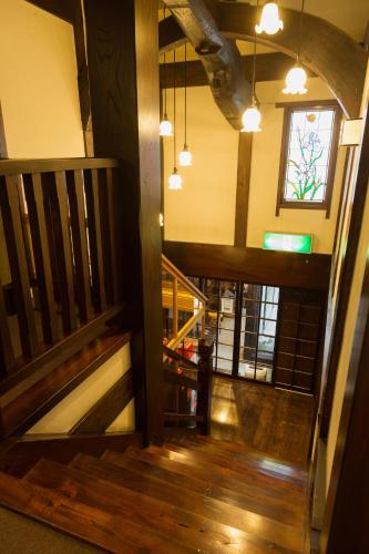 an overhead view of a staircase in a building at Ryokan Asunaro in Takayama