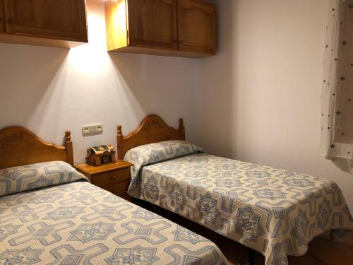 En eller flere senge i et værelse på Casa Maria y Julián