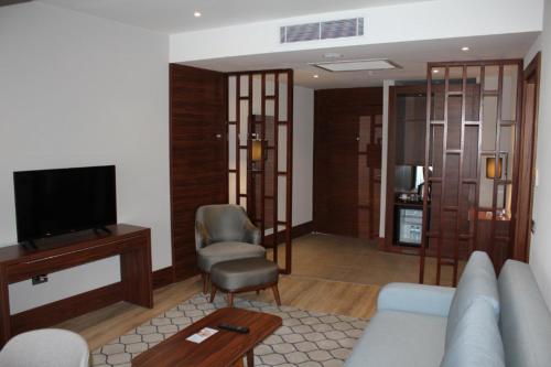 TV a/nebo společenská místnost v ubytování Seven For Life Thermal Hotel
