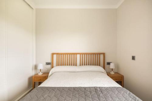 Posteľ alebo postele v izbe v ubytovaní apartamento chousa