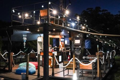 a house with lights on top of it at night at Hotel Opal in Jupiter