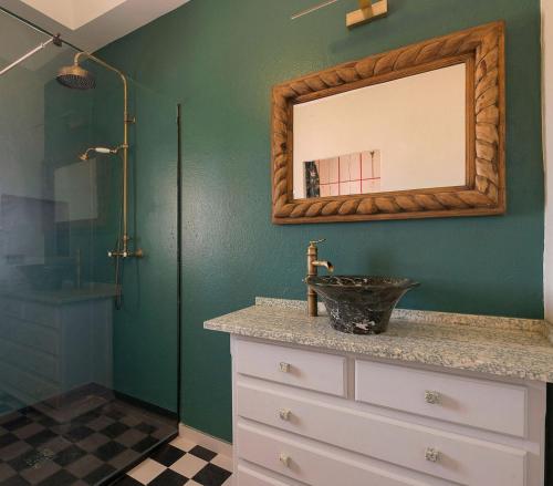a bathroom with a sink and a shower at Cortijo La Mina by LaJudería de Vejer - Luxury Villa in Conil de la Frontera