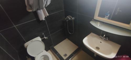 A bathroom at ODYSSEAS HOTEL SAMOS