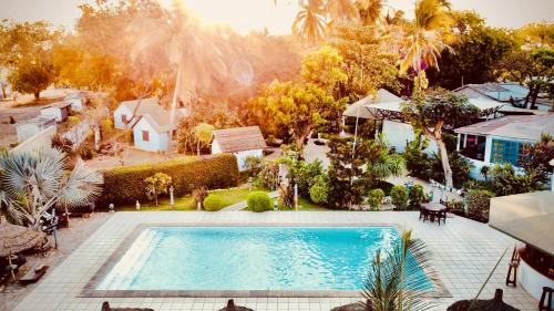 The swimming pool at or close to CHEZ ALAIN