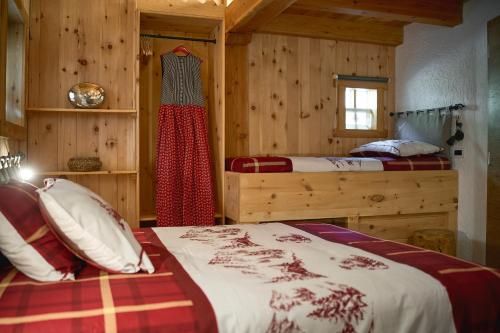 Postel nebo postele na pokoji v ubytování Natural Lodge Maso Baseta