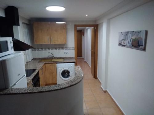 Kuchyň nebo kuchyňský kout v ubytování Apartamento Cullera Playa San Antonio
