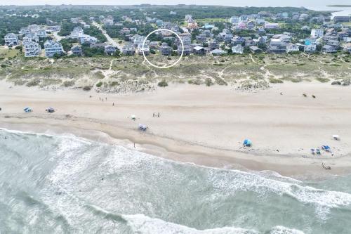 an aerial view of a beach with a group of people at Gray Haven #11-DE in Avon