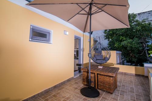 Patio alebo iná vonkajšia časť ubytovania Ialemos Group