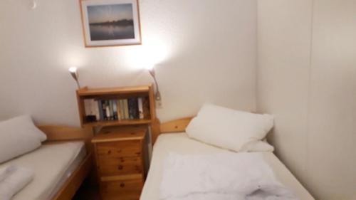 Ein Bett oder Betten in einem Zimmer der Unterkunft Ferienwohnung Plexnies - [#527]