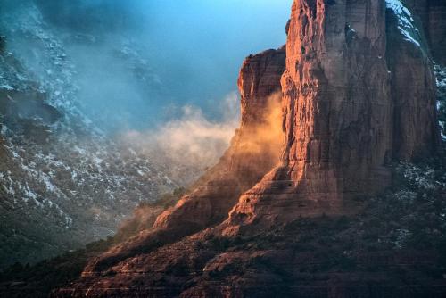 a view of a mountain with smoke on it at Sedona Studio at Thunder Mountain in Sedona